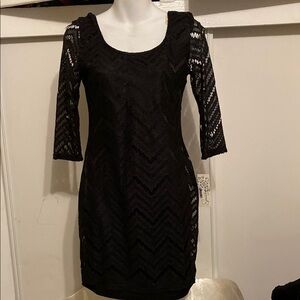 Peeckless  black dres size 7